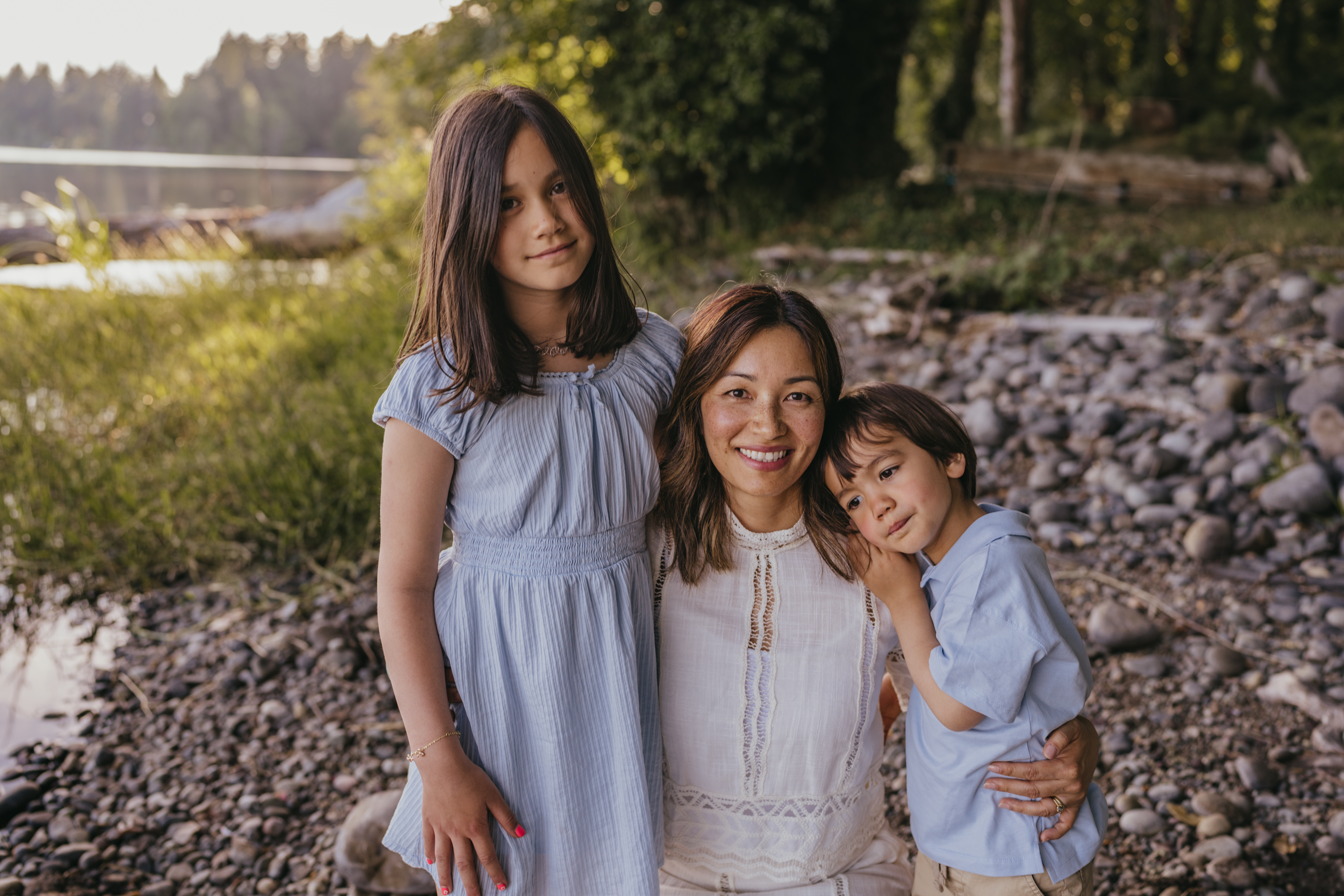 Mei with her two kids by the water